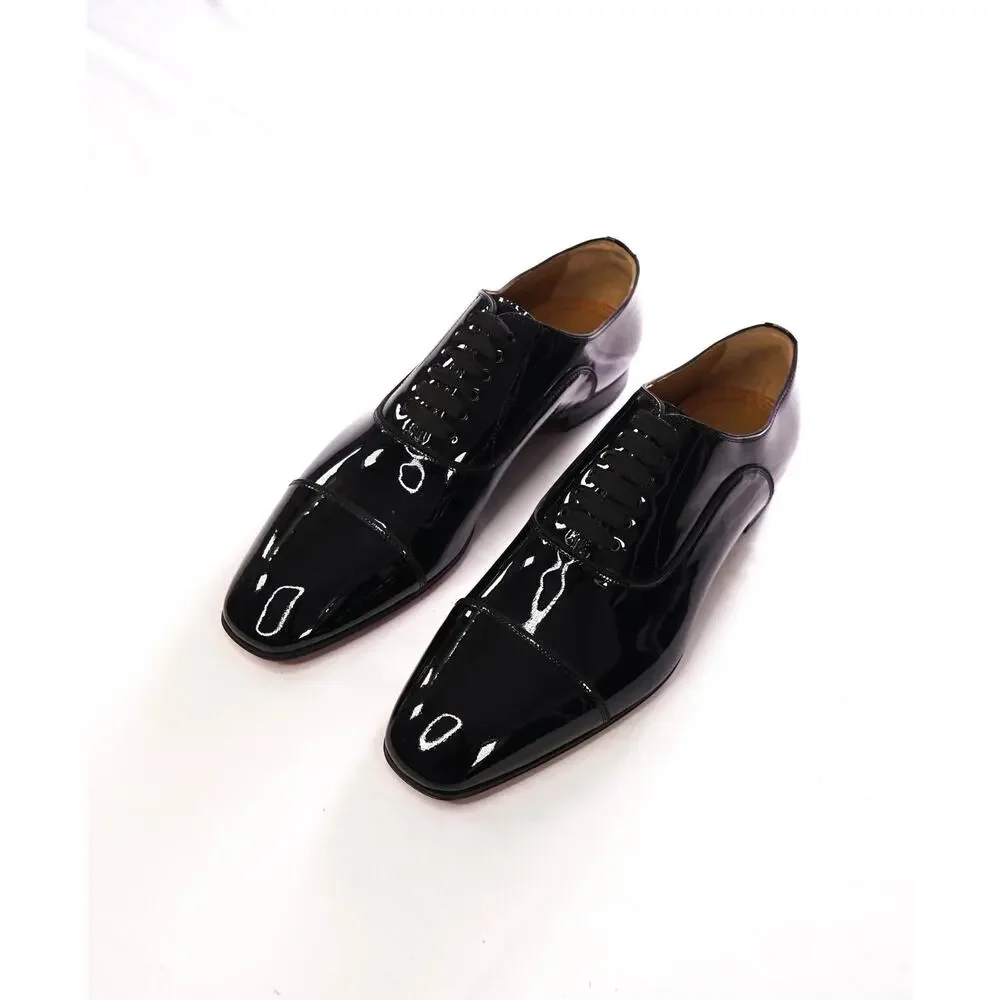 $1,295 LOUBOUTIN - Black Patent 